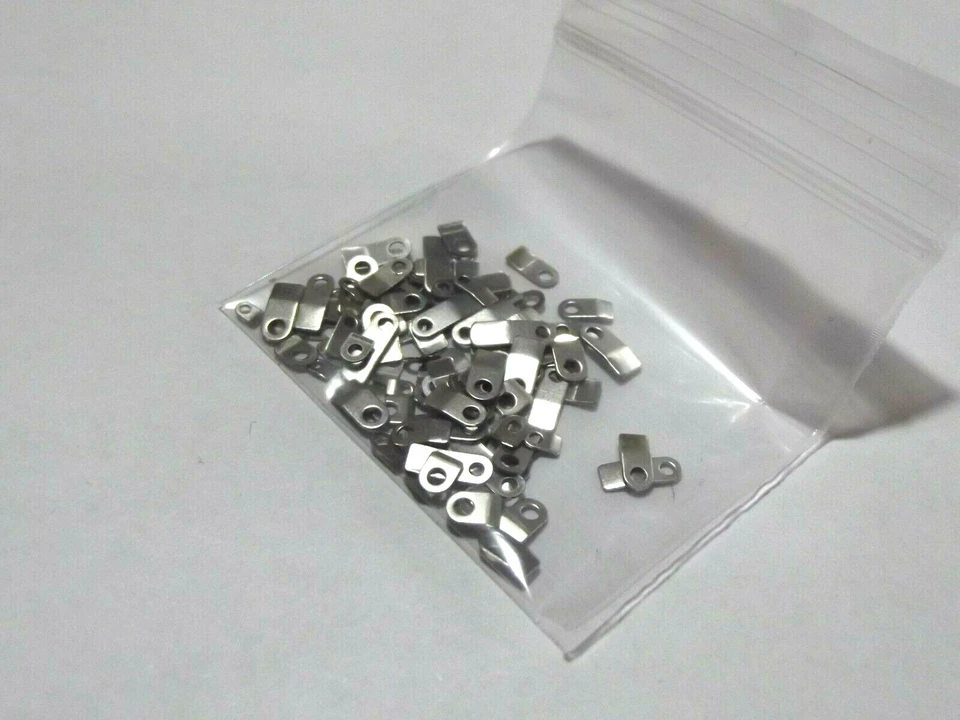 EW2009 Bride blocca ferma pile orologi 25 pz quartz movement battery clasp orologi