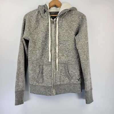 Chaqueta American Eagle Juniors Talla Mediana Con Capucha Bolsillos con Cremallera Cálida Acogedora Foto 1 de 4