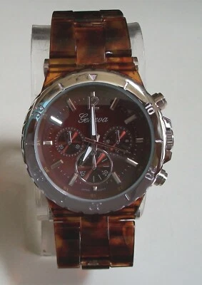 Reloj informal para mujer, niña concha de tortuga y acabado plateado moda novio Foto 1 de 4