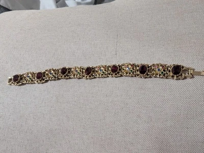  Vintage Costume Jewelry Bracelet With Seven Red Stones Trimmed In Gold - Image 1 of 4
