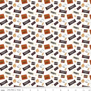 CELEBRATE WITH HERSHEY HALLOWEEN CANDY REESES ON WHITE RILEY BLAKE FABRIC HY - Picture 1 of 1