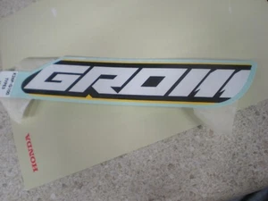 NOS OEM Honda Left Side Cover Mark (Type 3) 2022 Grom 125 86832-K26-G10ZC - Picture 1 of 2