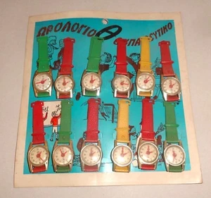 LOTE JUGUETES GRIEGOS VINTAGE x 12 RELOJES NIÑOS RELOJ JUGAR GRECIA AÑOS 70 - Imagen 1 de 6