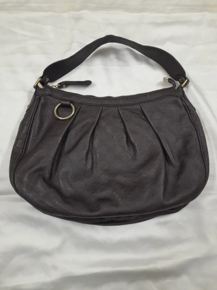 Bolsa hobo de couro com monograma Gucci GG - Imagem 1 de 4