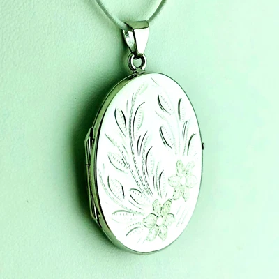 CIONDOLO ARGENTO 925 PORTAFOTO OVALE CESELLATO PENDENTE 2 FOTO MEDAGLIONE DONNA - Immagine 1 di 4