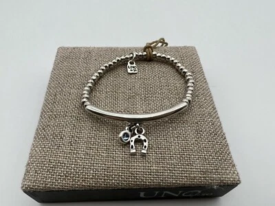 NUEVO Uno de 50 RIDING Pulsera Elástica Plateada Herradura Talla Mediana Foto 1 de 4