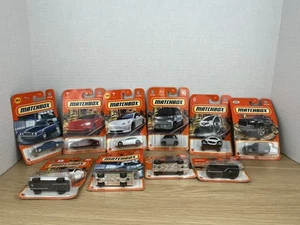 Lotto di 14 auto pressofuse Matchbox NUOVE Tesla, Citroën, Land Rover, Ford - Foto 1 di 6