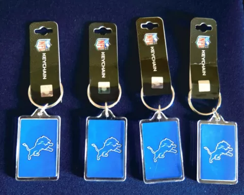FOUR (4) DETROIT LIONS ACRYLIC KEY RINGS FROM PRO SPECIALTIES Cover
