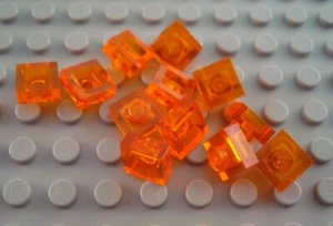 LEGO Lot of 12 Translucent Orange 1x1 Plates - Picture 1 of 1
