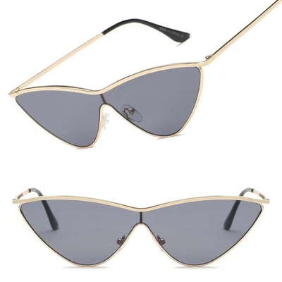 Gafas de sol minimalistas para mujer elegantes ojo de gato marco dorado lentes tintadas grises Foto 1 de 3
