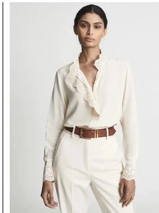 Blusa REISS... Suero de leche manga larga con volantes y tapeta talla 6 - Imagen 1 de 9