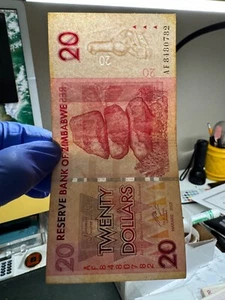 Authentic Zimbabwe 20 Dollars Banknote Bill, CIRCULATED Currency 2007, P-68 - Picture 1 of 8