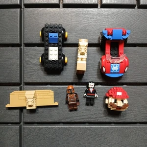 Lego Lot zusammengebaut - 2 Figuren - 7 zufällige Stücke - Fahrzeuge Mario Egyptian ZC - Bild 1 von 6