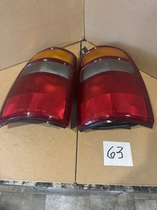 2000-03 Suburban Yukon Tahoe NOS Taillights Part #15198452-5978265 - Picture 1 of 5