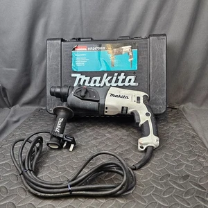 Taladro percutor rotativo Makita HR2470WX 24mm Mandril 780W 240V con empuñadura + estuche - Imagen 1 de 13