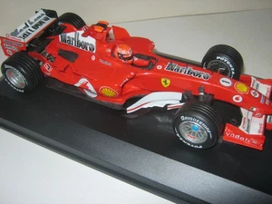 1:18 Ferrari F2005 M.Schumacher 2005  full tabacco HotwheelsF1 in new showcase - Picture 1 of 3