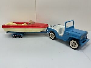 VINTAGE TONKA JEEP WITH BOAT AND TRAILER