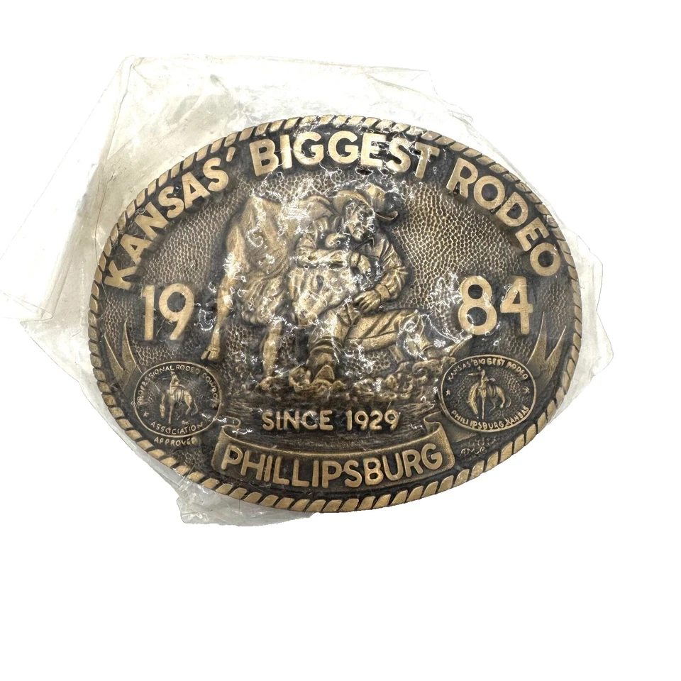 Kansas' Biggest Rodeo Phillipsburg Kansas 1984 hebilla de cinturón de latón #330 Foto 1 de 4