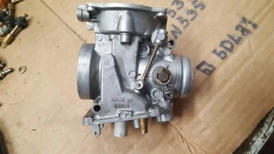 1986 1987 Suzuki GSXR1100  outer right carburetor body # 4 - Image 1 of 4