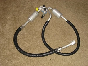 Used A/C Compressor Hose  [ fits ] 1997 Chevrolet Siverado 3 Door Extra Cab - Picture 1 of 2