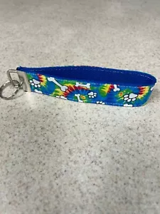 Portachiavi - stile polso - stampe zampe cucciolo e ossa su cravatta tinte - NUOVO! - Foto 1 di 1