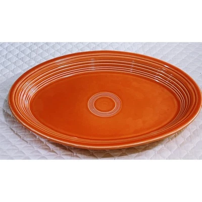 Fiesta Homer Laughlin China Co caqui coral color naranja plato ovalado retirado Foto 1 de 4