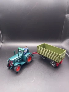 SIKU 1:32 HANOMAG TRAKTOR MIT 2 ACHSSEITENKIPPHÄNGER 1:32, 1:50 - Bild 1 von 11