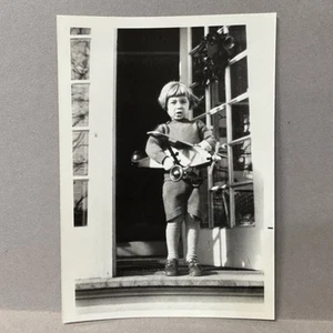 Vintage Found Photo Girl On Porch Playing With Wooden Airplane 1940s - Picture 1 of 2