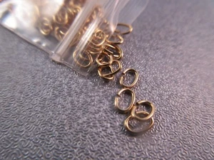 Anelli di salto ovali riempiti in oro 14 carati 5x3 mm calibro 22 20 pezzi - Foto 1 di 2