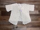 Girls hand made white short sleeved sweater. Size 4-6. Button close. Cardigan
