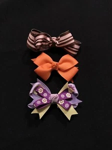 Arcos de pelo de 3 2 pulgadas naranja, diseño marrón y diseño foral púrpura y amarillo - Imagen 1 de 3