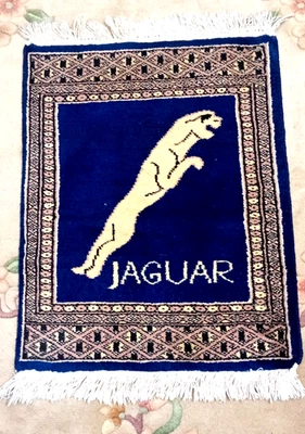 Alfombra de lana anudada a mano, logotipo Jaguar patrón tradicional turcomano o alfombra antigua Foto 1 de 4