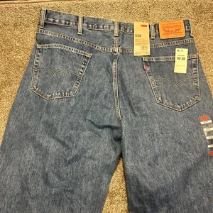 Neu mit Etikett Levi's 550 Herrenjeans 42x30 entspannt konisches Bein mittelgewaschen Denim blau - Bild 1 von 17