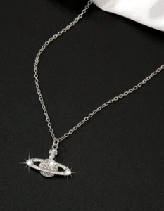 Silver Necklace with Saturn charm - planet necklace with cubic zirconia