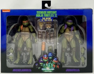 TMNT II Secret of the Ooze 1991 7" Michelangelo & Donatello 2Pk Nuevo Daño Menor - Imagen 1 de 7