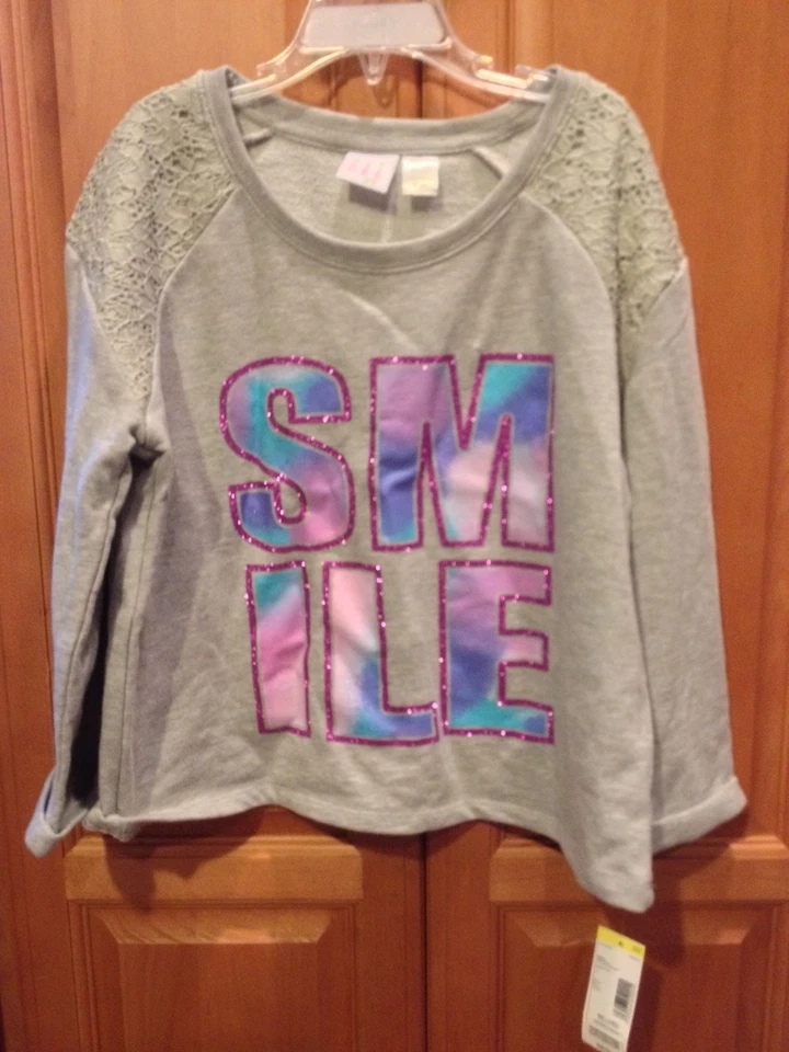 НОВЫЙ С ЯРЛЫКАМИ CANYON RIVER BLUES ДЕВОЧКИ СЕРЫЙ ТОЛСТОВКА «УЛЫБКА» БЛЕСТЯЩИЙ И КРУЖЕВНОЙ РАЗМЕР XL 16 - Изображение 1 из 2