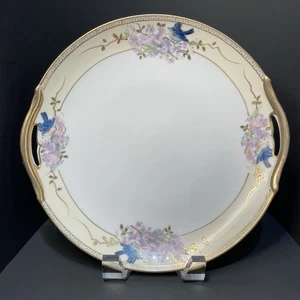 Piatto vintage Nippon a due manici con uccellini blu e disegni floreali. 9,75" - Foto 1 di 13