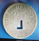 AIKEN COUNTY STORES INC. BATH & LANGLEY CLEARWATER,S.C. 25 CENT  TOKEN L CUT OUT
