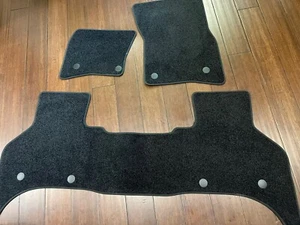 2020-2025 Genuine Land Rover Defender Carpet Floor Mats Ebony - Picture 1 of 7