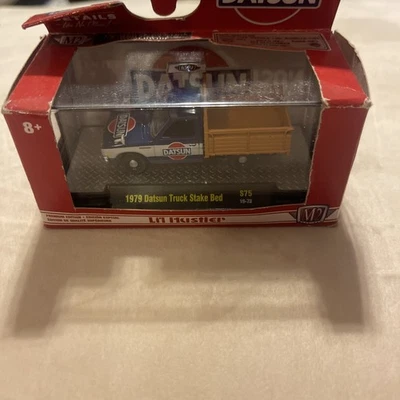 1/64th M2 Machines 1979 Dotson Truck Stake Bed S 75 ￼ - Image 1 of 4