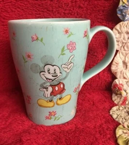 Tazza Topolino stile vintage blu chiaro sfondo floreale e interno sbiadito vecchia - Foto 1 di 5