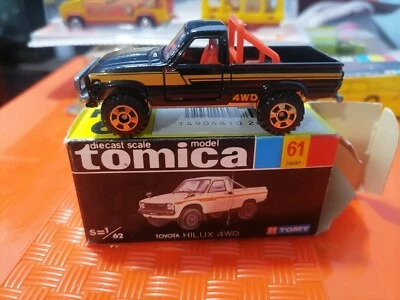TOMICA 61 TOYOTA Hilux 4wd Preto feito no Japão 1974 Estado perfeito na caixa - Imagem 1 de 4