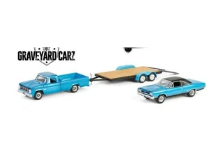 1:64 Greenlight - 1969 Plymouth GTX with 1967 Dodge D-200 & Flatbed Trailer - Imagen 1 de 1