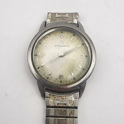 Reloj automático Eterna EternaMatic vintage para hombre correa Speidel NECESITA REPARACIÓN Foto 1 de 4