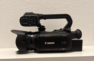 Cámara de video digital Canon XA30 profesional HD con estuche de transporte impermeable Foto 1 de 4