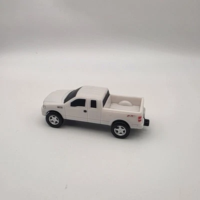 ERTL 福特汽车公司 2004 F-150 FX4 皮卡车 - 白色 - 3 英寸 — 第 1/4 张图片