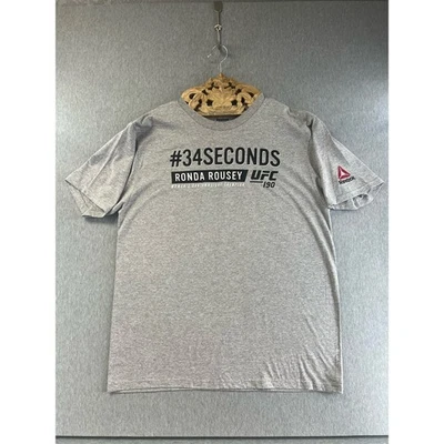 NEW UFC Ronda Rousey #34 seconds 190 Brazil Reebok T shirt Gray  - Image 1 of 3