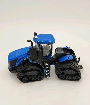 Tractor fundido a presión TOMY Ertl 1:64 New Holland SmartTrax-II azul 13905 Foto 1 de 4