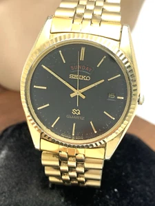 Reloj Seiko Hombre Cuadrado Cuarzo Vintage Esfera Negra Día Fecha Dorado Acero Inoxidable 36mm - Imagen 1 de 12
