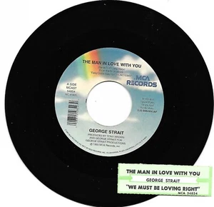 George Strait, The Man In Love With You/We Must Be Loving Right 45 VG+/VG- 1993  - Picture 1 of 2